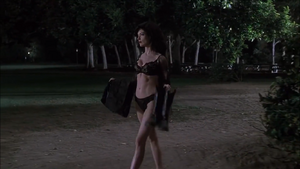 Serleena walks away from the park with his clothes.