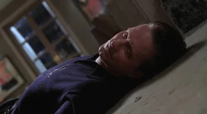 Taylor lies dead after being shot twice in the chest