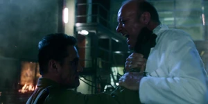 Grigori strangling the scientist to death on Stepanov's orders.