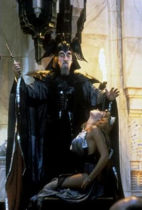 The Grand Vizier and Princess Jehnna - Publicity Still of Jeff Corey and Olivia d'Abo (1984).
