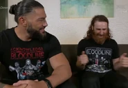 Sami Zayn and Roman Reigns.