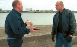 Phil has a showdown with Grant over Kathy in October 1999.