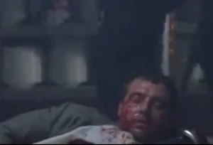 Paulie's dead body.