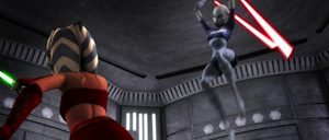 Ventress leaps into the air before engaging Tano in a lightsaber duel.
