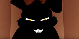 Springtrap smiles maliciously from the shadows.