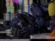 Chica bites Nightmare Bonnie hand