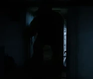 Fredbear near a fridge