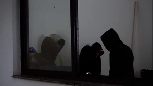 A group of masked people of which the leader might be either someone else or The Invader himself, foreshadowing there might be a second season
