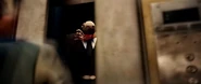 Stalingrad attempts to stop his quarries from escaping, but is attacked by the Creature