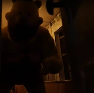 Fredbear charging at the door