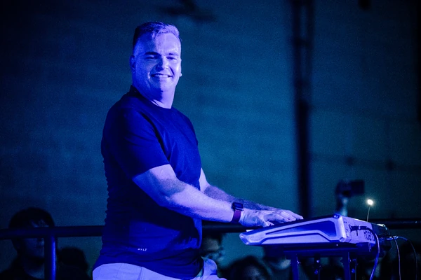 Bill on Keyboard smiling for the Camera enjoying the moment.