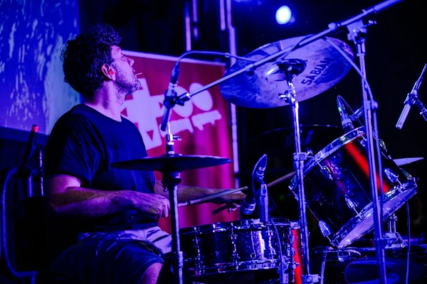 Mike jamming hard on the drums.