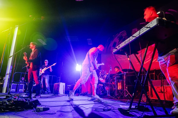 Dynamic shot of the band.