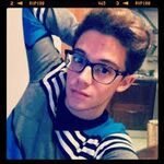 Ruggero wearing glasses 