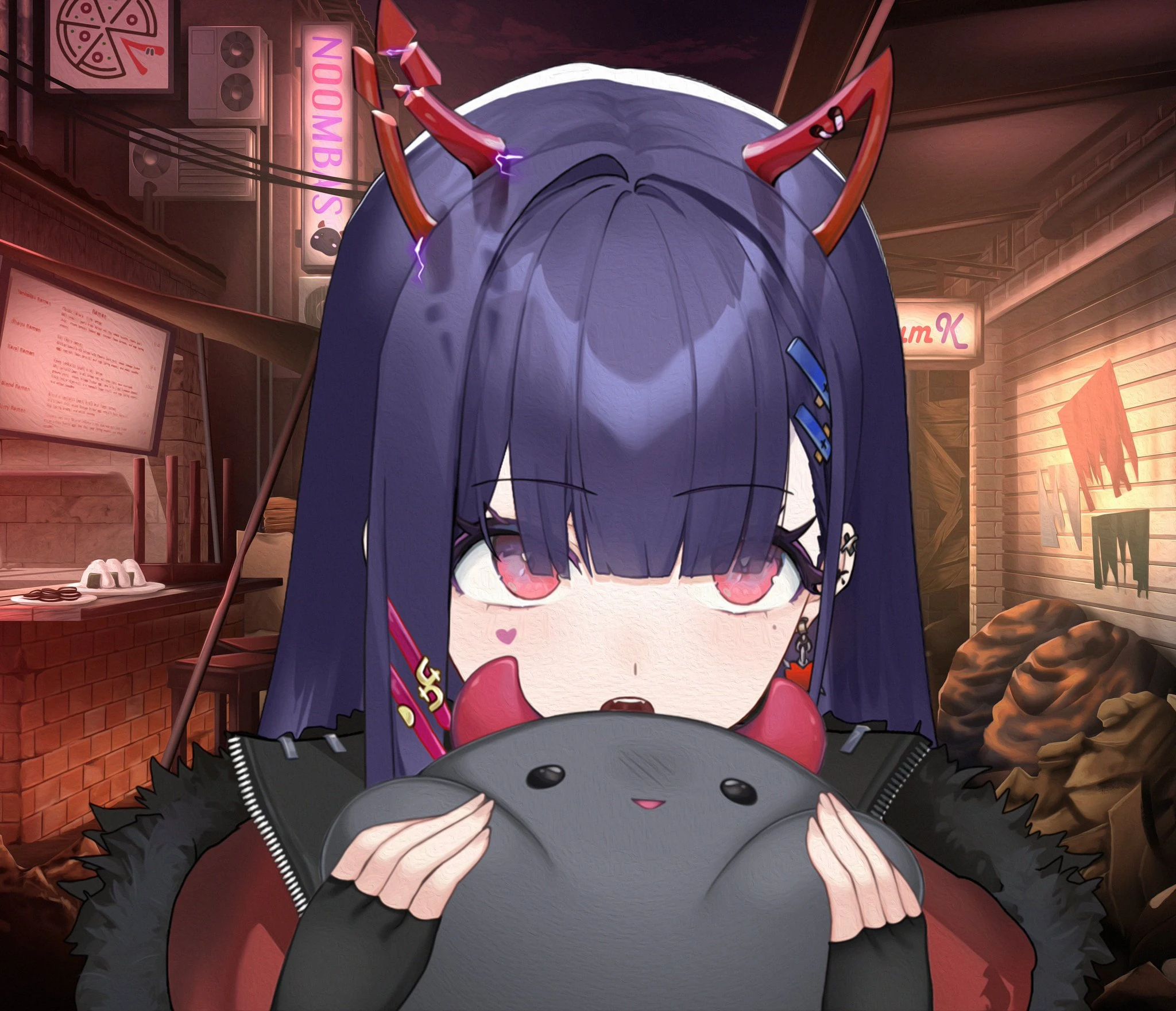 Numi holding a noomba