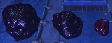 The three different sized models of burnt-organic matter.