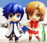 Nendoroid figurines of KAITO and MEIKO referencing their items (an ice-cream and sake).