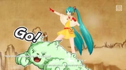 A screenshot of Miku singing the song in -Project DIVA- f.