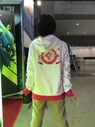 Model from C89 showing the PROJECT:AKAZA Hoodie, Back