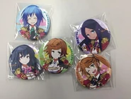 Promotional pins distributed at the Comiket event