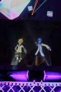 Len and KAITO performing "erase or zero".