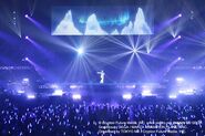 KAITO performing "Snowman" at the "Hatsune Miku Magical Mirai 2015" concert.