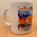 Close up of the back of the Mirai Komachi Mug prize featuring artwork from the song "future beat"