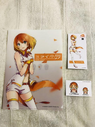 Close up of Mirai Komachi merchandise including a Clear File & Stickers