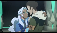 After Allura awakes from her cryosleep, Lance catches her.