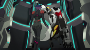 S6E07.215. Krolia loading Shiro in his pod into the Black Lion