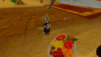 Lnik on Return to Duat staring at a fruit plate