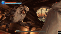 Kazuma performing Komaki Tiger Drop against one of the two tigers he has fought (as a Heat Action)