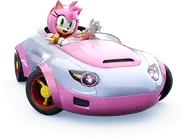 Amy driving her Pink Cabriolet