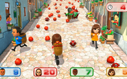 Maria (as Player 2) with Jeff, Kazuhiko, and Mizuho in Apple Scramble.