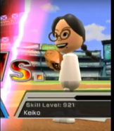 Keiko pitching in Baseball.