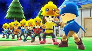 From left to right: Marit, Ricardo, Jialan, Skip, Polly, Chris, and Mizuho, all wearing Chocobo hats, next to an unknown Mii in a Geno costume.