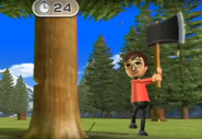 Luca chopping down a tree in Wii Party.