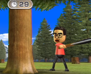 Shouta participating in Timber Topple in Wii Party