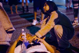  comforts Watanabe after he fails the marathon 8% of the way through.