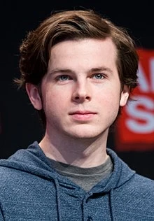 220px-Chandler Riggs - 2018077122146 2018-03-18 Walker Stalker Con - Sven - 1D X MK II - 605 - AK8I9646 (cropped)