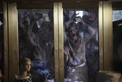 Brick-Wielding Walkers Bradbury's These walkers were the first walkers depicted using an object or tool: bricks, to break through a glass door to get to Rick and his group.