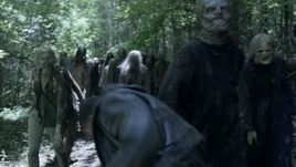 11x08 Negan stabs Paul