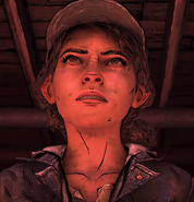 Clem with bloody flashlight