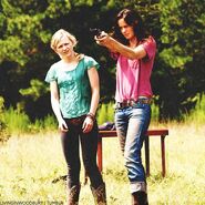 Beth and Lori target practice at farm