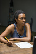 Sasha Williams Working Out Infiltration Plans 7x14 Promo Image