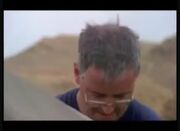 Mike Benton in excavation site in Tunisia.