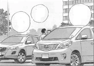 A parked Toyota Alphard (right)