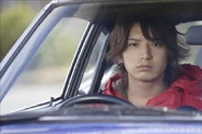 Akio Asakura in Wangan Midnight: The Movie. Played by Yūichi Nakamura.