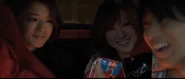 The Girls (in back of Ma in Live-Action movie.