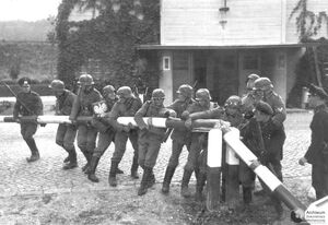 German soldiers destroying Polish border checkpoint on 1 September. World War II begins.